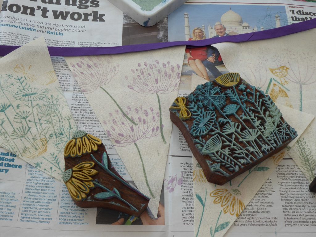 Picture of 2 wooden blocks face up on a table